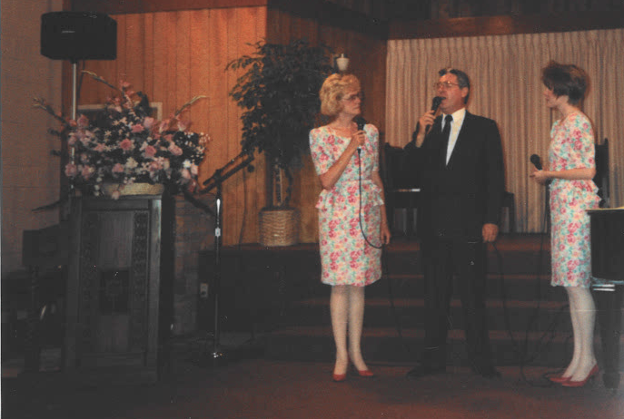 The Chuck Fulmore Trio sings at a church event