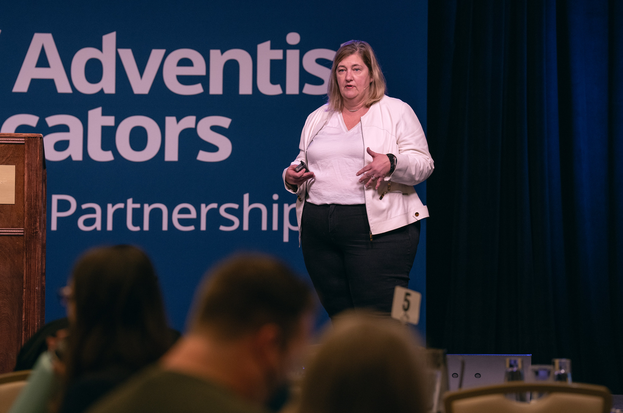 Erin Byrne, CEO of ThinkSisu, gives the keynote address at the 2023 Society of Adventist Communicators convention. 