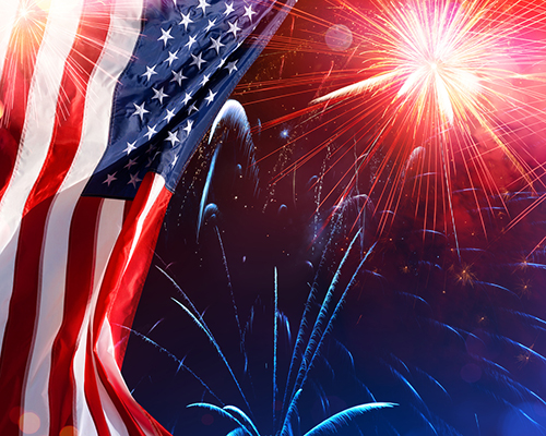 U.S. flag and fireworks closeup 