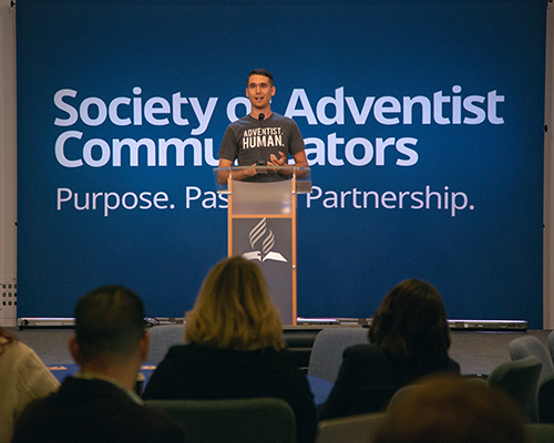 Kaleb Eisele, creator of “Humans of Adventism,” the social media storytelling ministry, tells attendees, “Everything we do, you can do on your cell phone.”