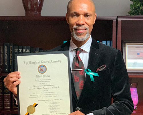 Pastor Anthony Medley with government citation