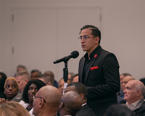 Mark Galvez, a student delegate from Southern Adventist University, advocates for sponsorships of young adult-produced podcasts. 