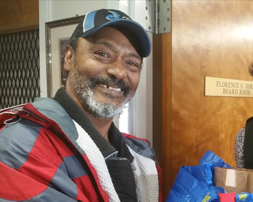 ACS of Greater Washington gives away 30-pound Thanksgiving meal baskets.