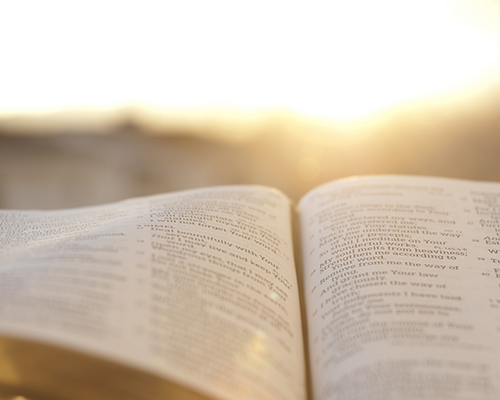 Bible with sunset glow