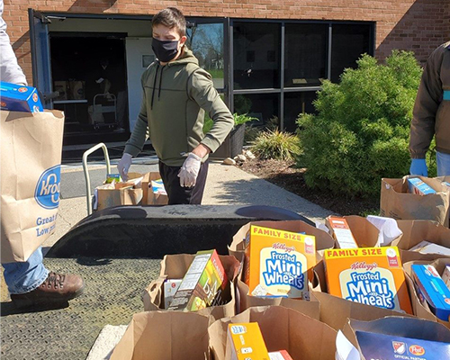 Volunteer organizes food at the Jackson Community Services Center in Jackson, Michigan. 
