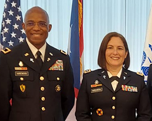 Chaplain Brigadier General Andrew R. Harewood and Lieutenant Colonel Wanda Acevedo smiling in uniform