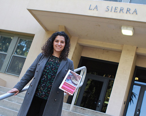 Woman standing in front of La Sierra University.