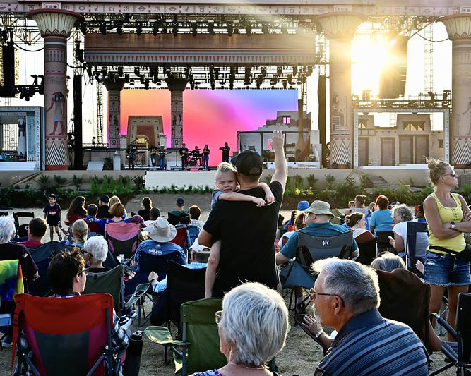 People gathered together to watch a play