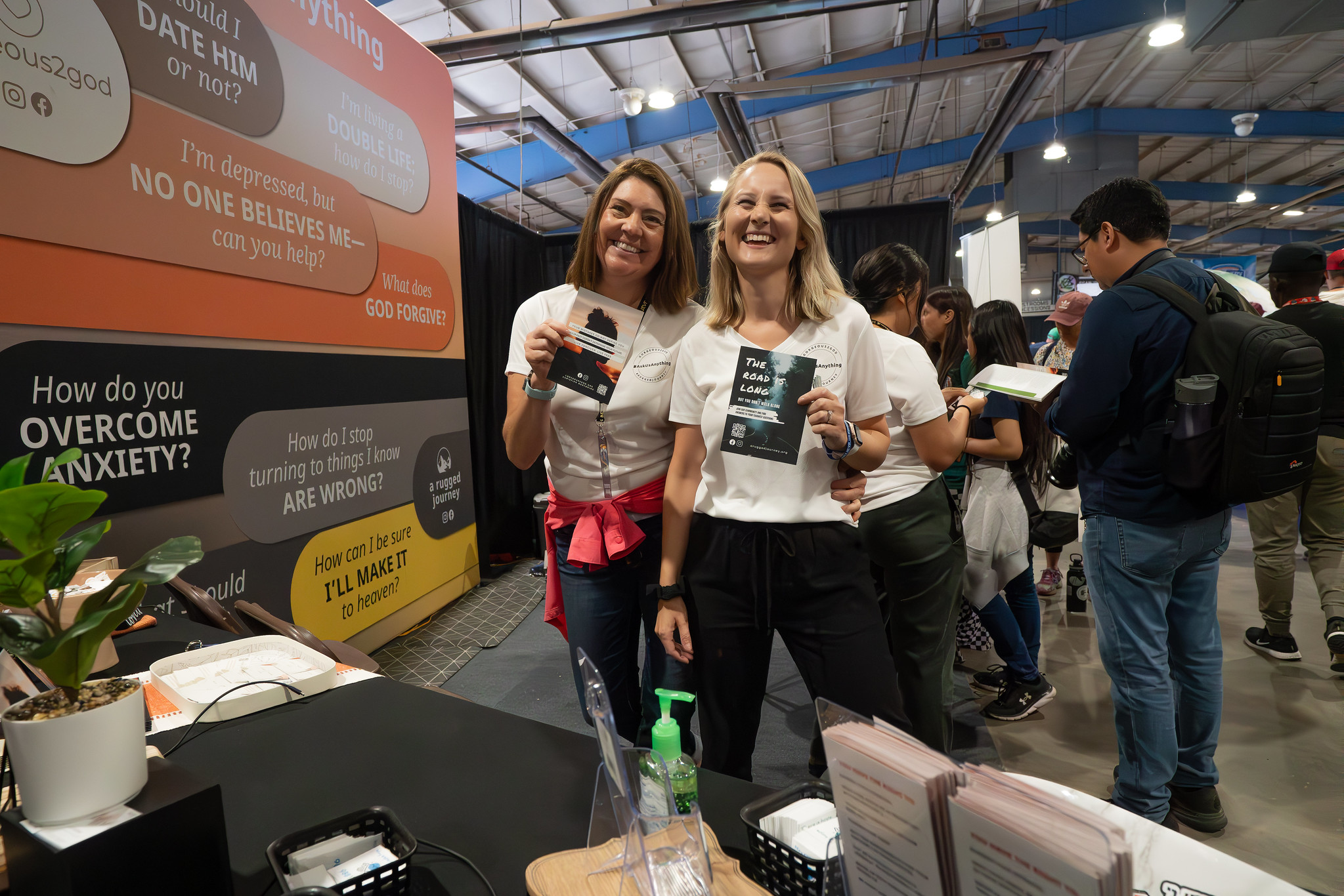 2.      DeeAnn Bragaw, NAD Women’s Ministries director, and Erica Jones Smith, assistant director, at their booth during the 2024 “Believe the Promise” International Pathfinder Camporee. Photo: Art Brondo | North American Division