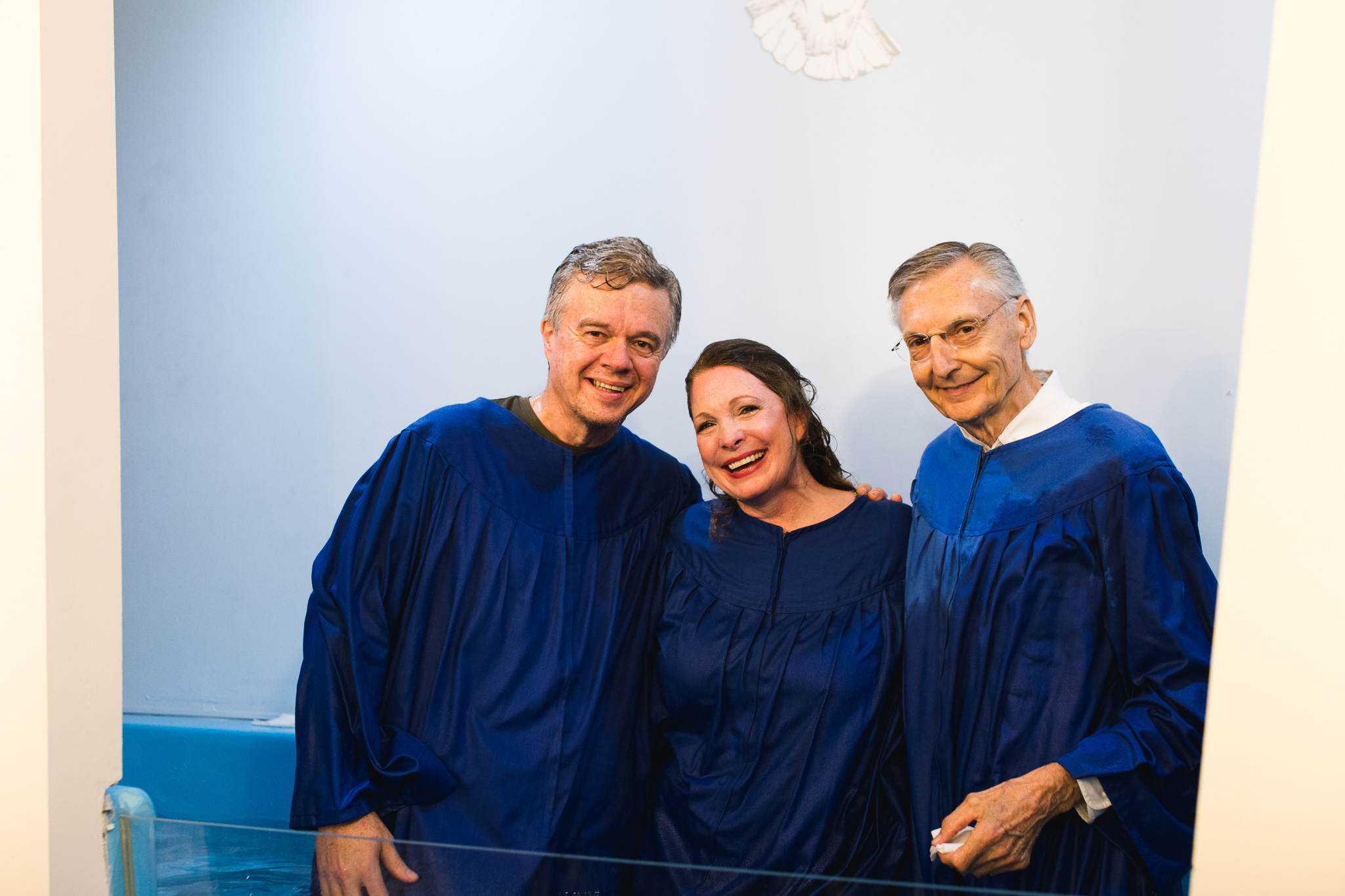 Hayes and Paige Parnell smile alongside Pastor Edward Skoretz after their baptism at Summerville Seventh-day Adventist Church in Summerville, Georgia.