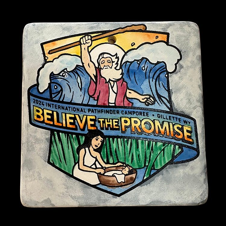 a photo of the "Believe the Promise" logo emblazoned on pottery