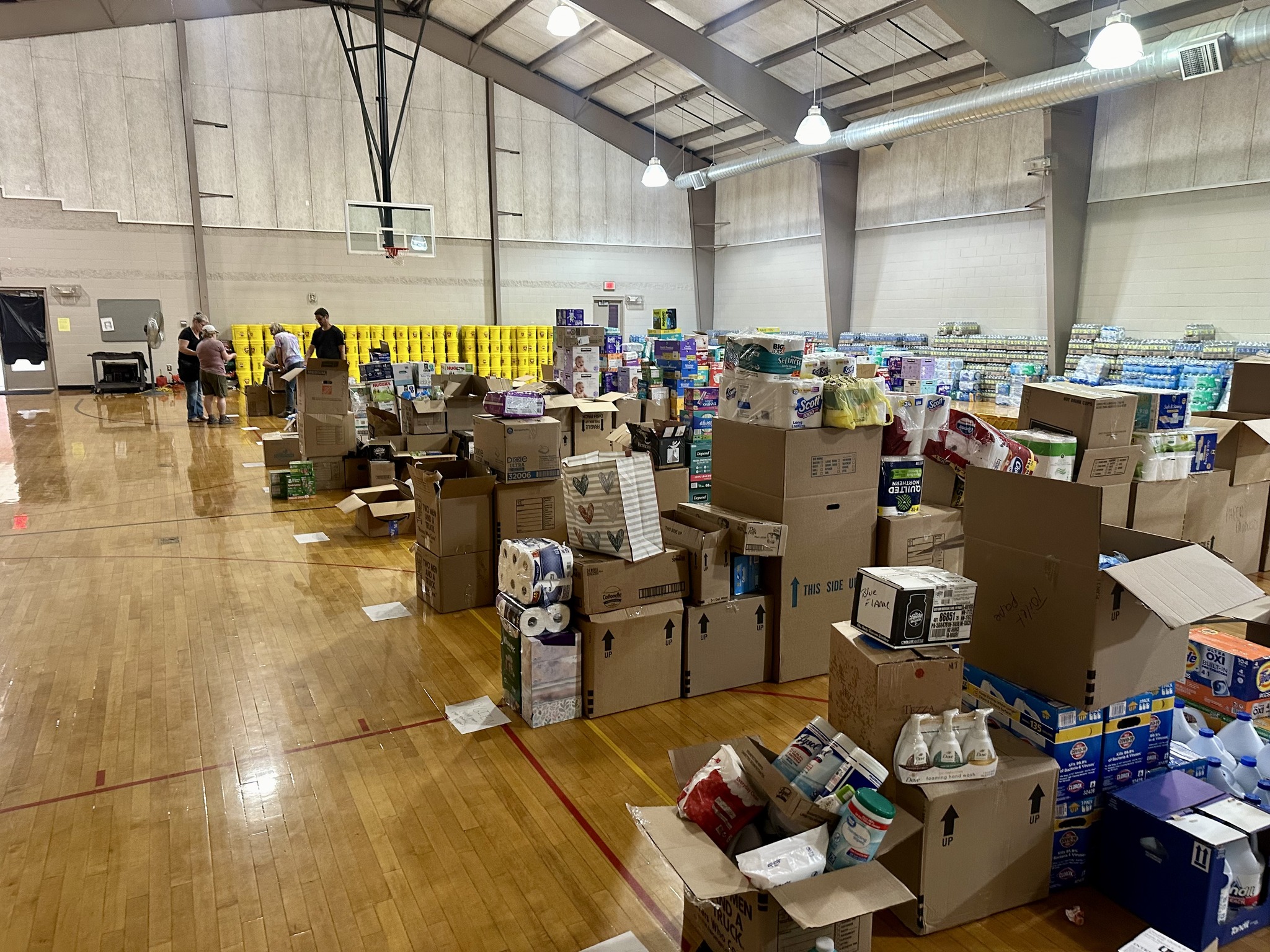 Foster Adventist Church gym is filled with supplies to help victims of Hurricane Helene