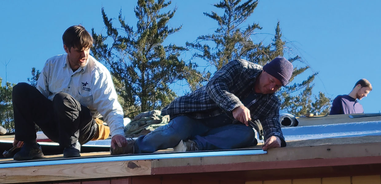 New roof is put on a members house in Georgia but other church members