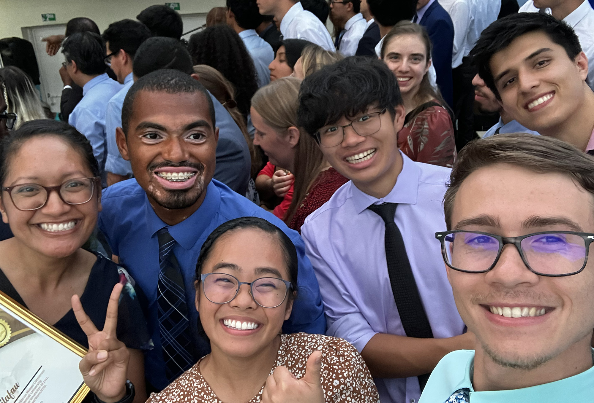 Selfie of diverse group of young men and women